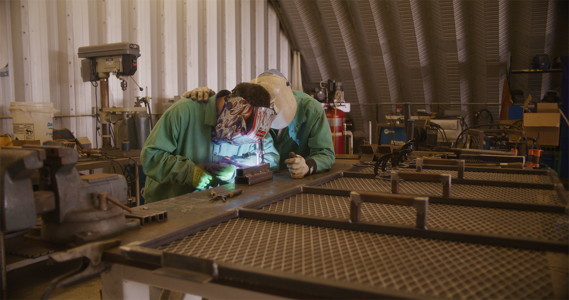 Two men welding